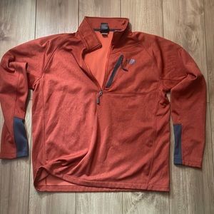 The North Face 1/4 Zip in Orange.